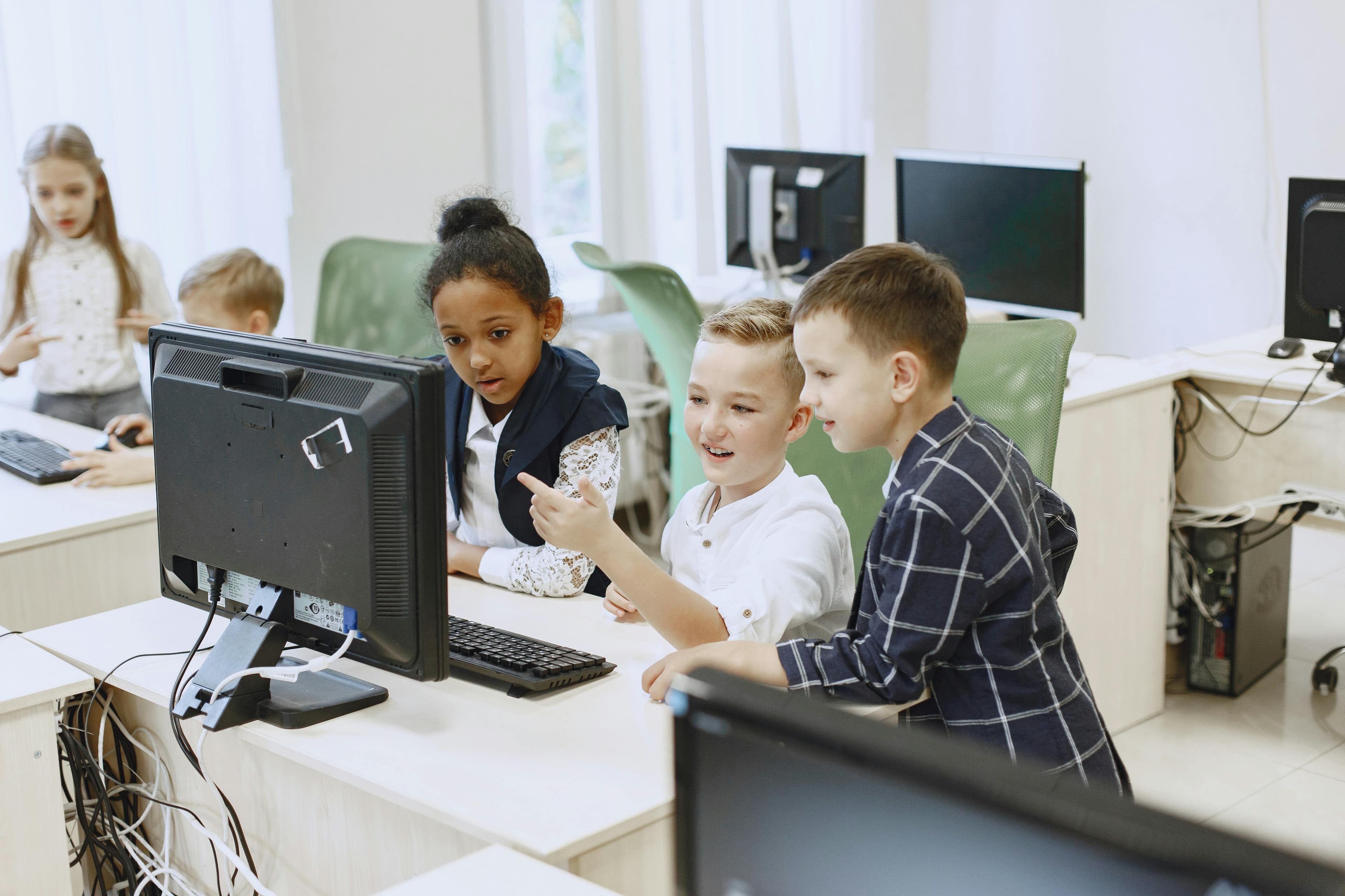 Children learning on computers